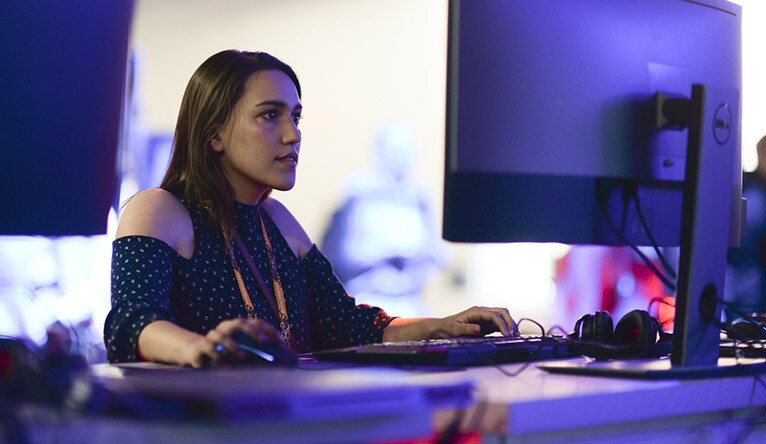 Woman working on a computer at a Dell Event