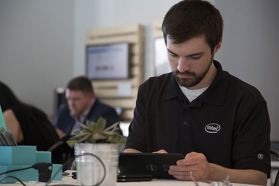 Man sitting in DellVenue coworking space using a tablet