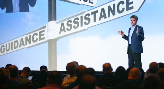 Dave Hansen on stage speaking at Dell Peak Performance 2014 event