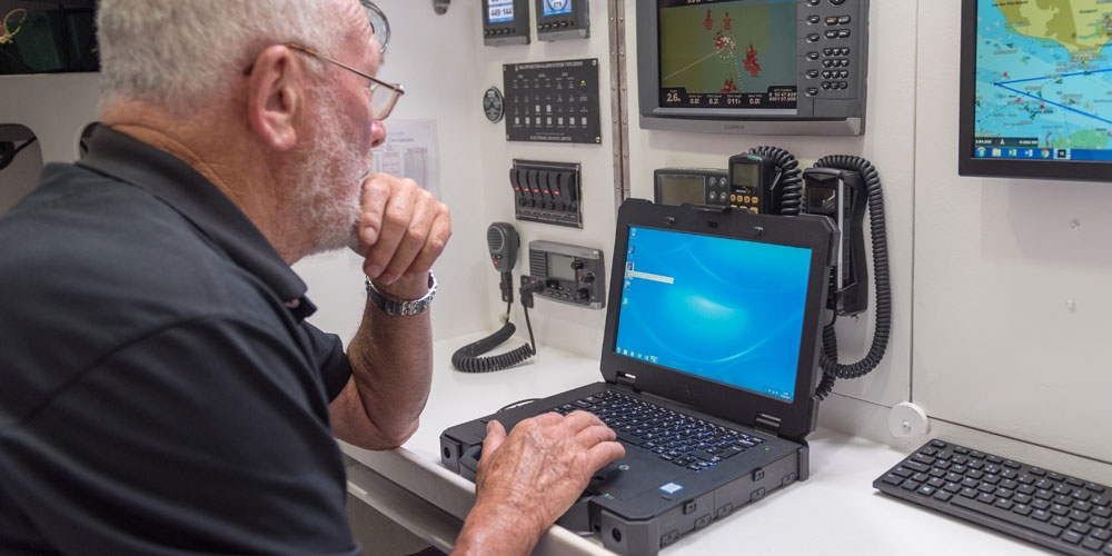 Sir Robin Knox-Johnston, Founder the Clipper Race with a Dell Latitude Rugged laptop