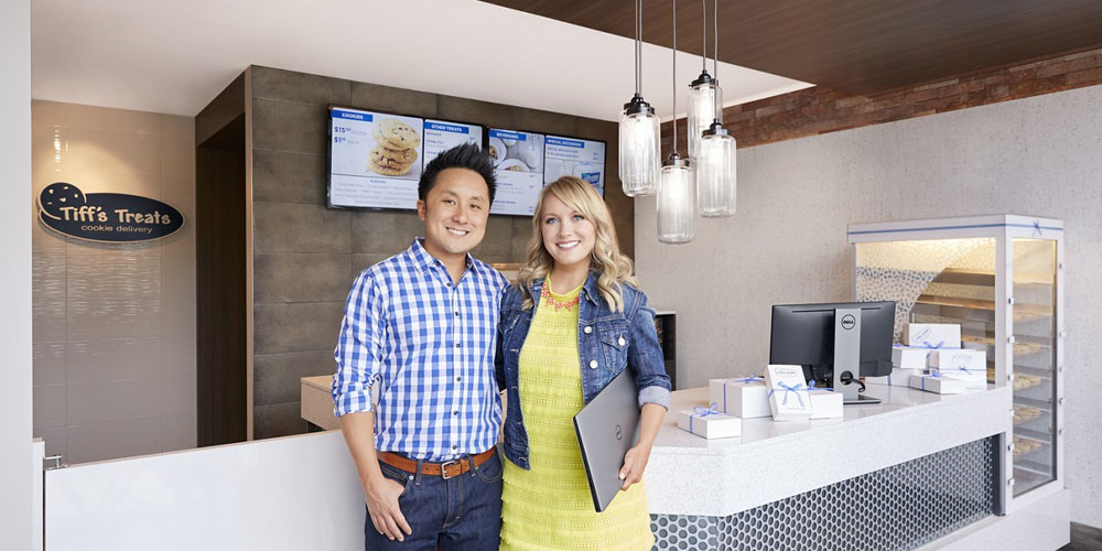 Tiffany and Leon Chen, founders and owners of Tiff’s Treats, stand in one of their stores in Austin, Texas