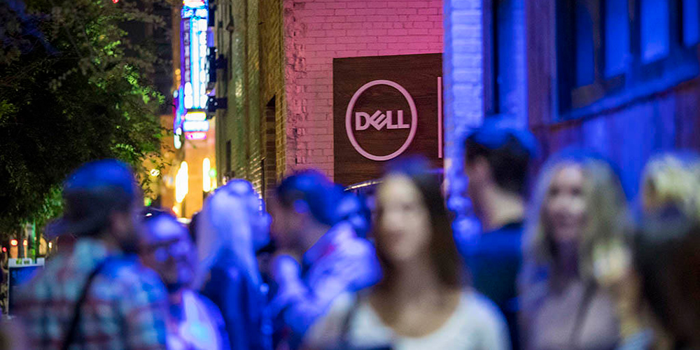 people on the street at night outside the Dell Experience at SXSW 2017
