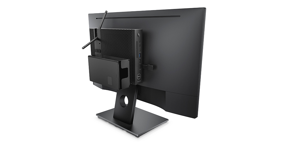 Dell Wyse 5070 mounted behind a Dell monitor display