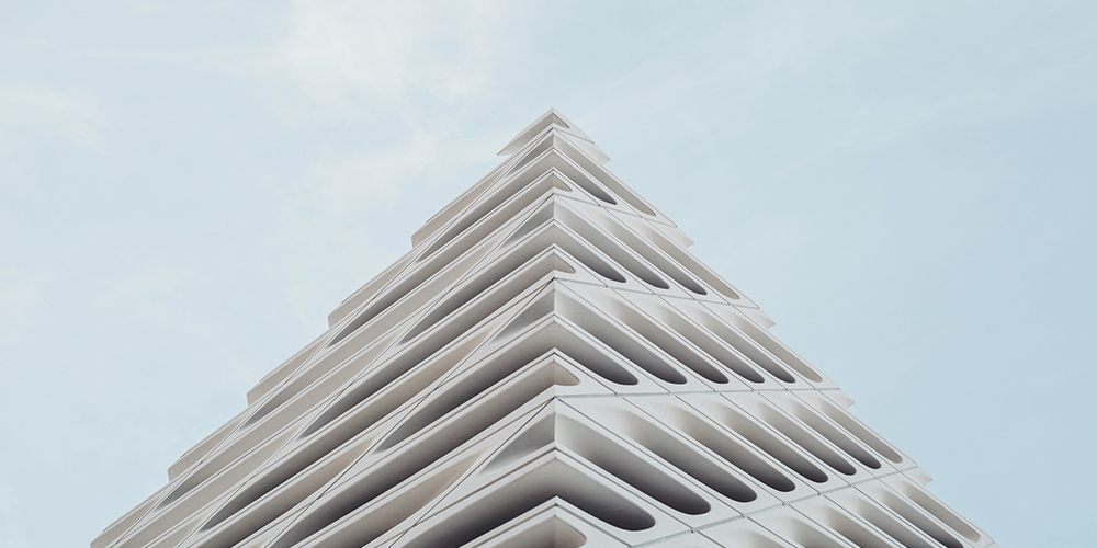 pyramid-shaped white building