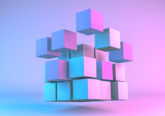 Cube building blocks coming together, in neon pink and pastel colors.