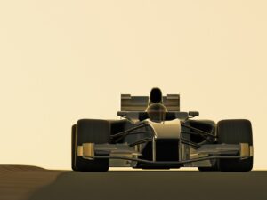 Front view of a black F1 car, in silhouette.