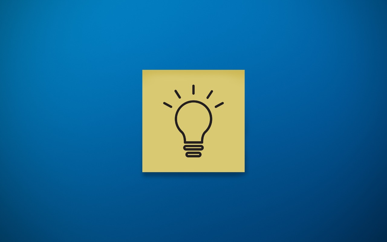 Image of an idea lightbulb on a yellow sticky note.