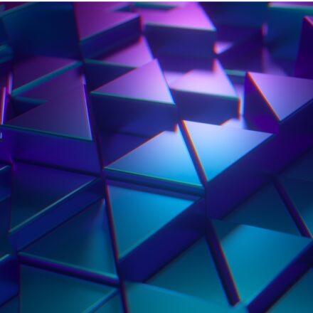 Digital rendering of metallic, glossy triangles pattern, in teal and purple colors.