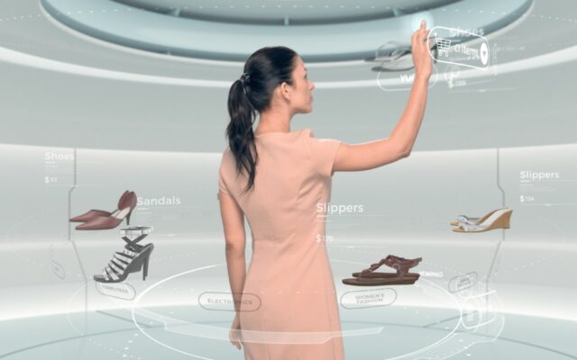 Woman shopping for shoes virtually in AR retail environment, powered by 5G technology.