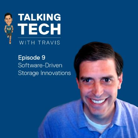 Travis Vigil with his running bobble head in upper left corner, next to Talking Tech logo.