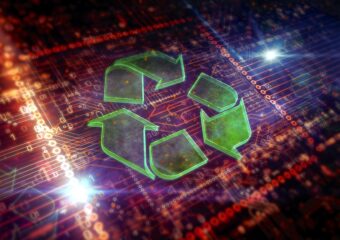 3D illustration of the green recycle logo against a technological dark red/ochre background. Representative of efforts to manage e-waste.