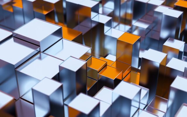 Abstract digital image of geometrics cubes of silver, white, blue, and copper of varying heights and sizes