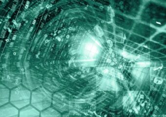 Digital abstract image, tinted in green of tunnel comprised of binary code and hexagonal grid in the foreground.