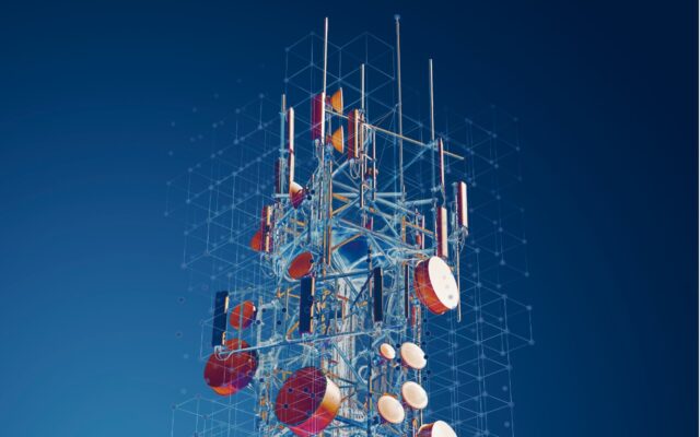 5G telecommunications tower with digitized connection points overlaid on the image.