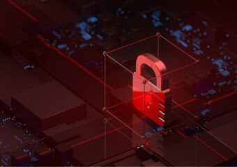 Red padlock in locked position on a motherboard, representative of cybersecurity against ransomware, malware and other threats.