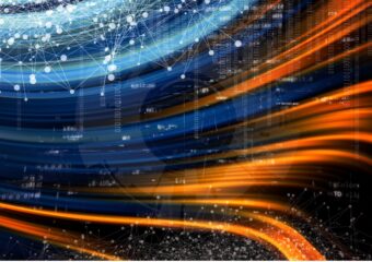 Digitally generated abstract image of data in motion in streaks of colors, primarily blue, sky blue and dark orange against a black background. Connected data points can be seen in the foreground.