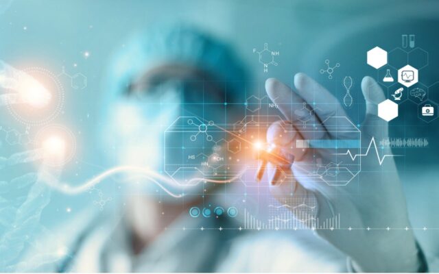 Image of a doctor in mask, gloves, and hair covering with a digital representation of a DNA molecule in their hand. Image is against a light blue background and focus is on their left hand.