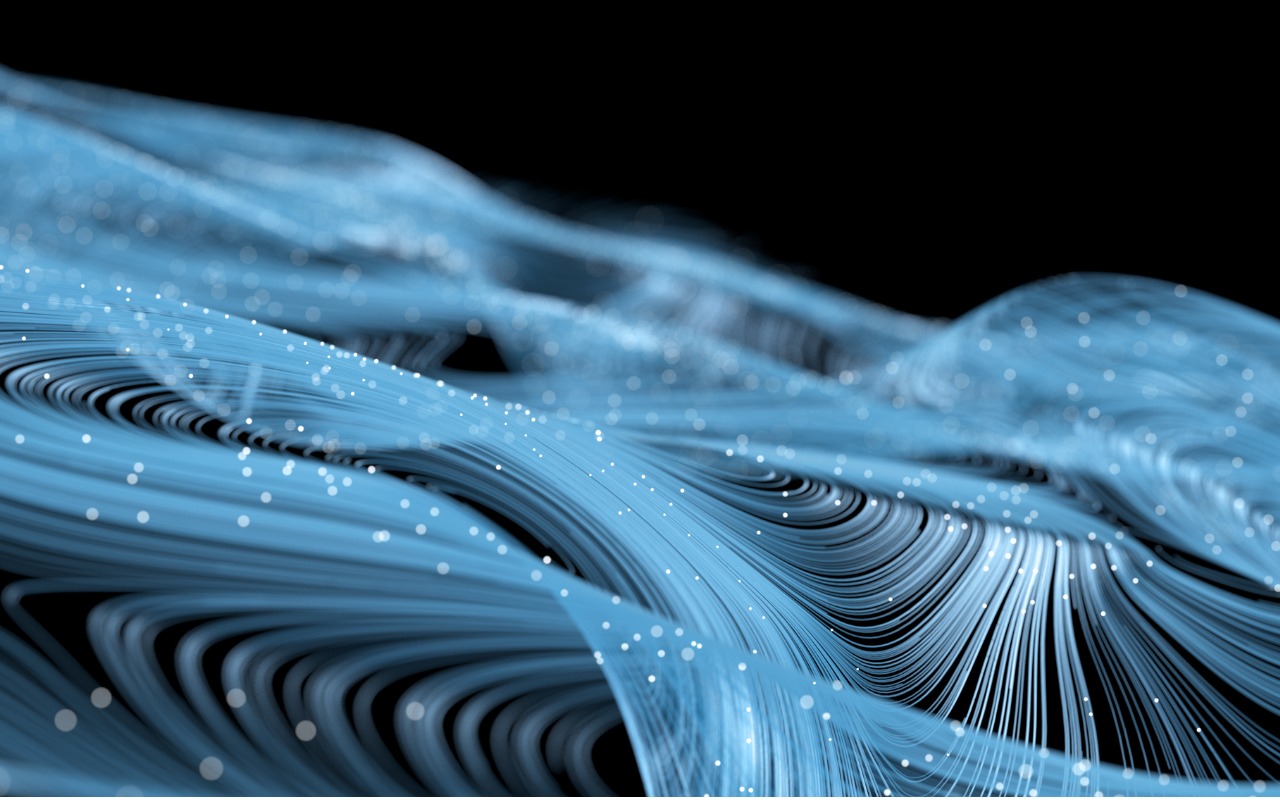 Abstract digital graphic showing light blue and silver colored lines with white nodes interspersed, giving appearance of a topographical map, against a black background.