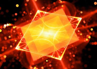 Digital rendering of an orange colored processor with red outlines against a dark background, representative of futuristic quantum computing.