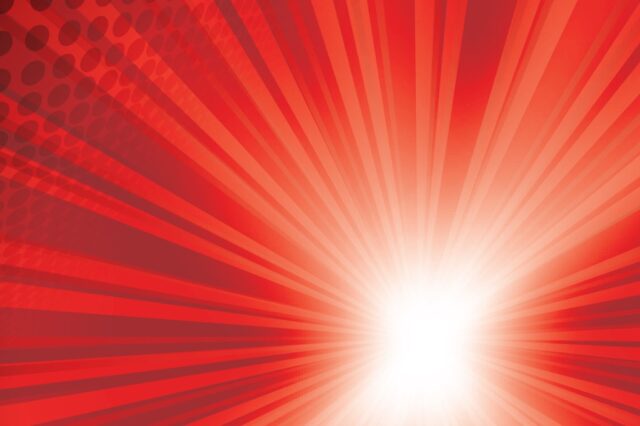 White light source in lower right corner emanates rays of light against a red background with hints of black circles in the upper left corner.