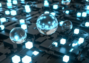Digital image of spheres with blue lights on a high tech motherboard platform.